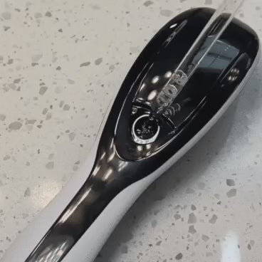 “Hair Growth Steam Brush”